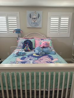 White twin bed and white dresser