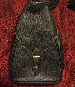 Black leather sling/backpack. Excellent condition.