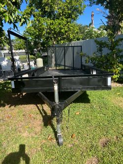 7' x 16' Tandem Axle Landscaping Utility Trailer with Trimmer Rack.