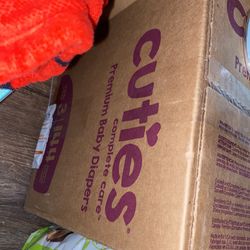 2 Boxes Of #4 Cuties Diapers