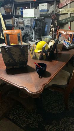 Solid wood table set w chairs and expanders very good just needs a little attention soils furniture