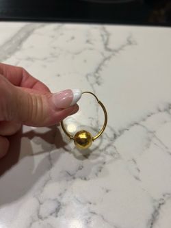 Brand new gold hoops with hammered gold ball