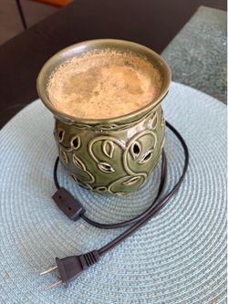 Plug in oil warmer