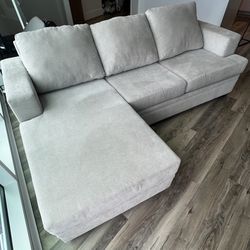 Sofa With Reversible Chaise And Ottoman 