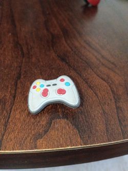 Video game controller clock pin