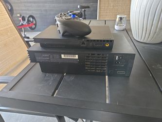 Ps2 and ps2slim  no Power Cord. Only missin the the from cover of the ps2