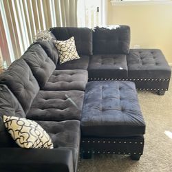 Black couch / with storage ottoman