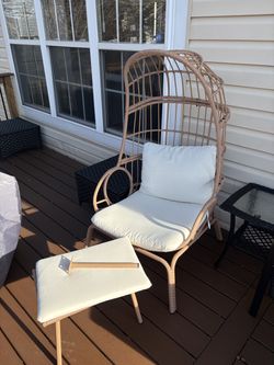 Egg chair with footstool