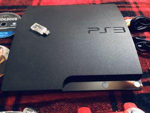 Photo PS3 SLIM 320 GB CONSOLE WITH 5 GAMES