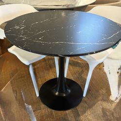 Modern dining table  Table top is 32” round faux marble, 