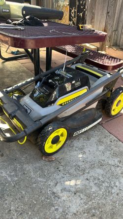 Ryobi lawnmower battery and charger