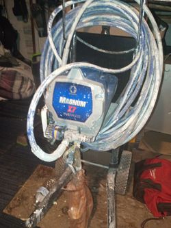 Graco airless paint sprayer xr7 magnum with gun and hose tips as well