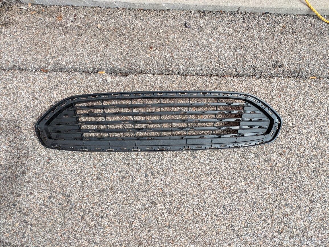 2013-2016 OEM Ford fusion front Grille without the chrome trim .