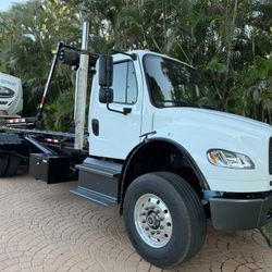 Rolloff Truck And 16-New 20 Yards . Cummins Automatic 