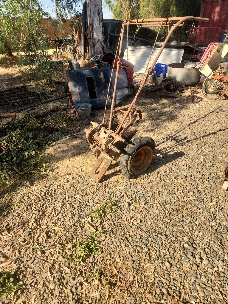 Yard Art Walk Behind Tractor Bohlens