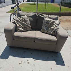 Ashley's Loveseat w/ Pillows