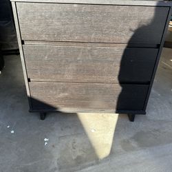 Black three-drawer Dresser