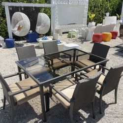 Outdoor Patio Tempered Frosted Glass NEW Table With 6 Outdoor Patio Stackable Grey Chairs With Cushions 
