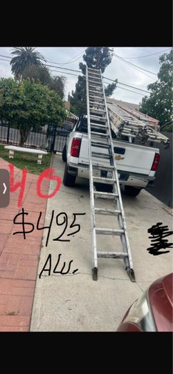 Excellent condition, 40 Feet and more sizes available aluminum extension, Ladders