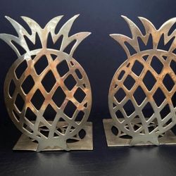 Pair of antique brass pineapple bookends or statues in good vintage condition. Set of 2 just…