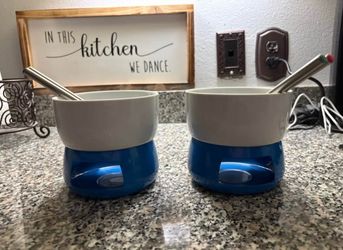Two fondue pots w/ forks