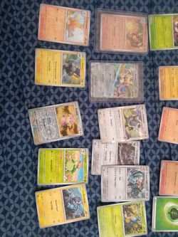 Pokemon cards hallowgraphic and yu gi oh red eyes black dragon