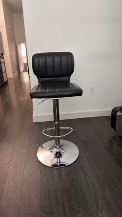 Troutville Swivel Upholstered Adjustable Height Counter Stool