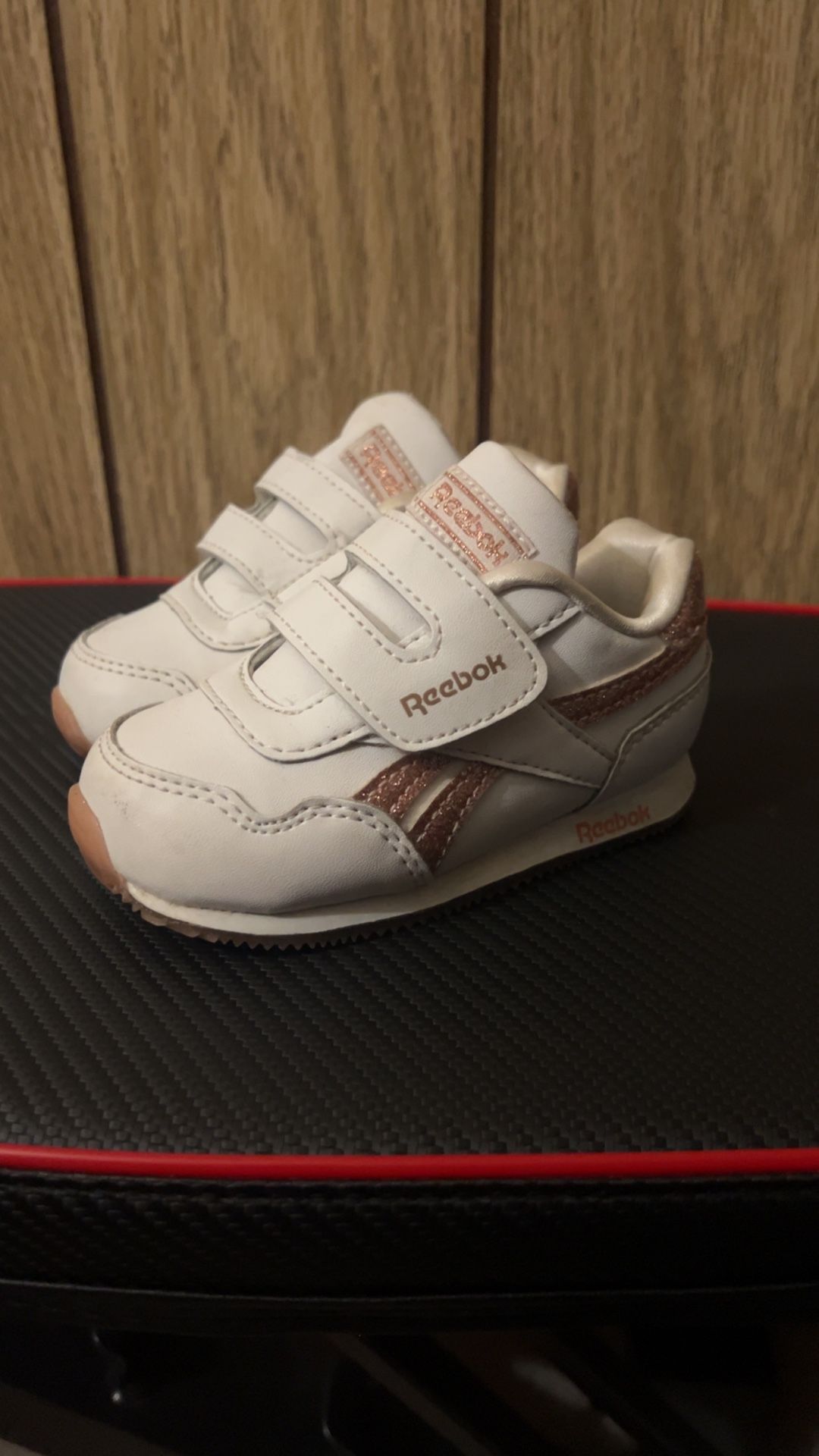 White/pink Reebok Size 5