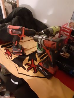 4 drill drivers Milwaukee M18 w xc 5.0 batt Ryobi One Plus w 2.0ah batt Hitachi Brushless 18v li ion +more