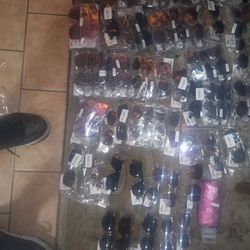 68 Pairs Of Brand New Sunglasses With The Price Tags On Them Ranging From $17 To $23 . All 68 Of Them For 30 Bucks