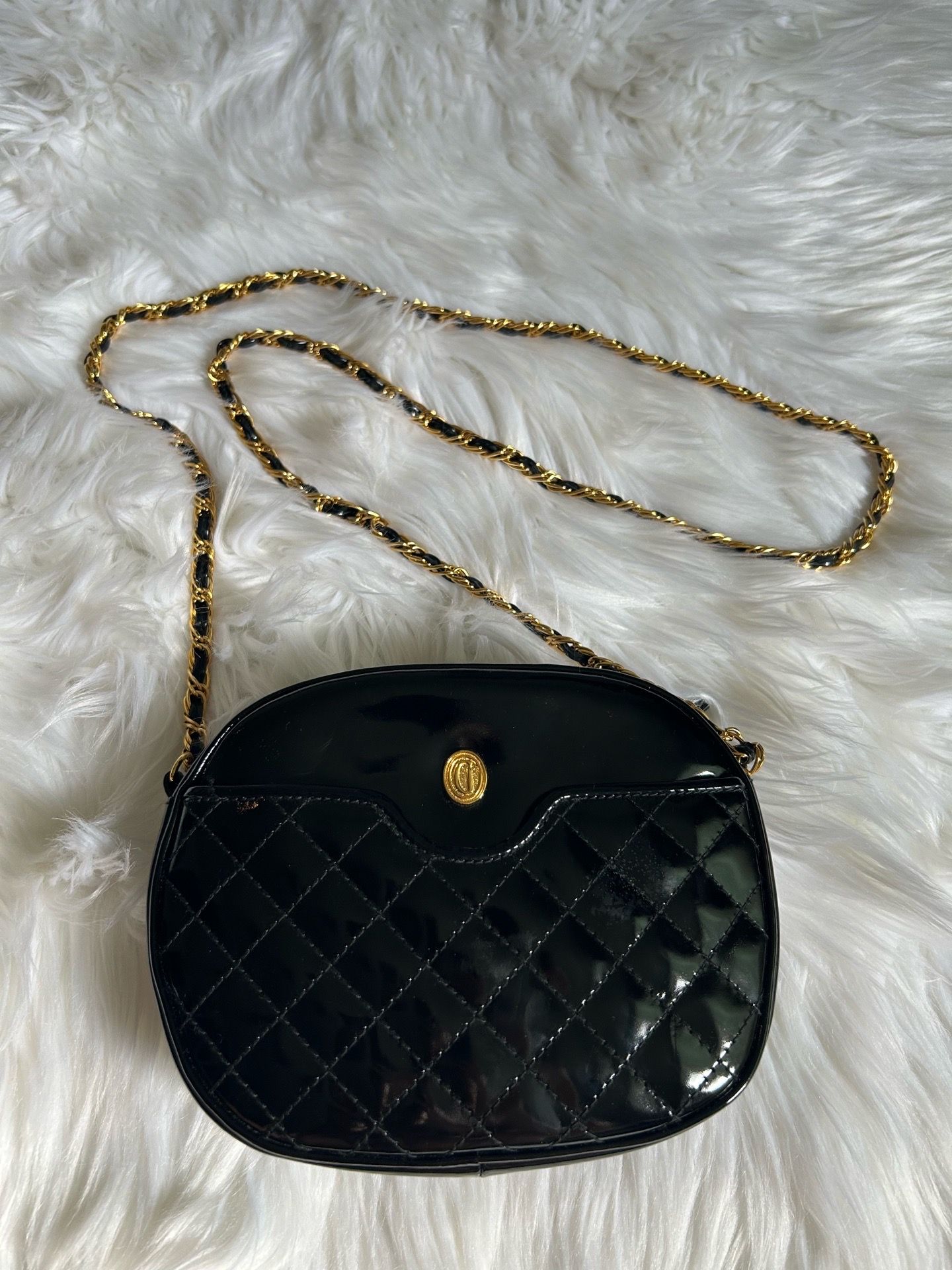 Vintage Ganson quilted black patent leather crossbody bag with a gold chain strap