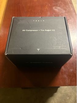 NEW Genuine TESLA air compressor and tire repair kit