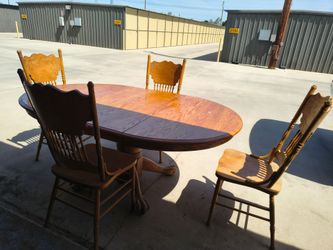 Solid oak table and chairs