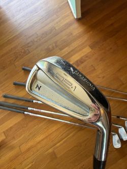 Nakashima, golf clubs and cobra driver ￼