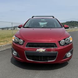 Chevy Sonic, 2014, Red. 4 Doors. 