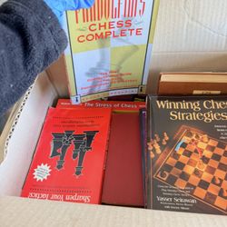 A Box Of Books On Chess Playing