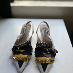 runway PRADA 2018 black yellow white fringe brogue stud pin kitten heel
