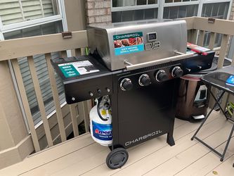 Charbroil Performance Series Black and Silver 4 -Burner Liquid Propane Gas Grill + Cover