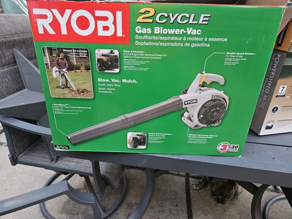 Brand new in a box 2 cycle gas blower with the vacuum on it. So it sucks up leaves too