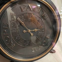 Rodalben Hope Faith Love Roman Numeral Wall Clock. It features the words "HOPE", "FAITH", and "LOVE"