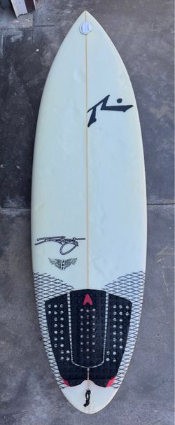 Rusty surfboard 5’7” $100