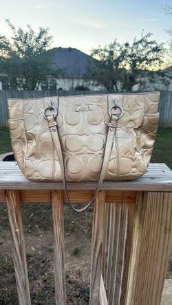 Authentic Gold Metallic Coach