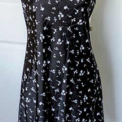 Beautiful black and white slip dress new with tags.