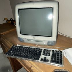 iMac Retro Computer With Mouse And Keyboard And Paperwork 