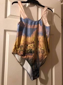 Size like L/XL bodysuit (no snap on the bottom) euc