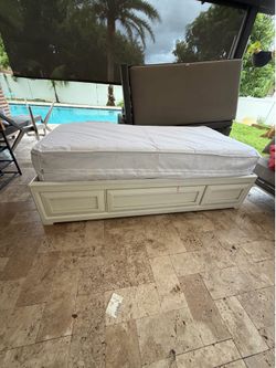 Twin bed with drawers