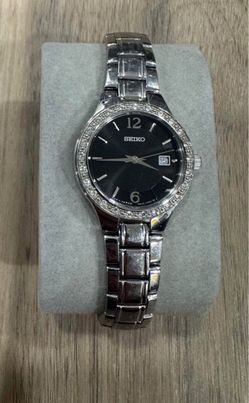 Seiko women’s stainless steel watch with crystal (diamond style) bezel and black dial
