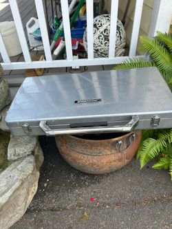 Brinkmann Two-Burner Propane Camp Stove: Features dual stainless steel burners (typically 10,000 to 12,000 BTUs each) with separate control knobs, aut
