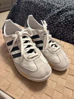 Adidas White Low-Top Sneakers with Black Stripes