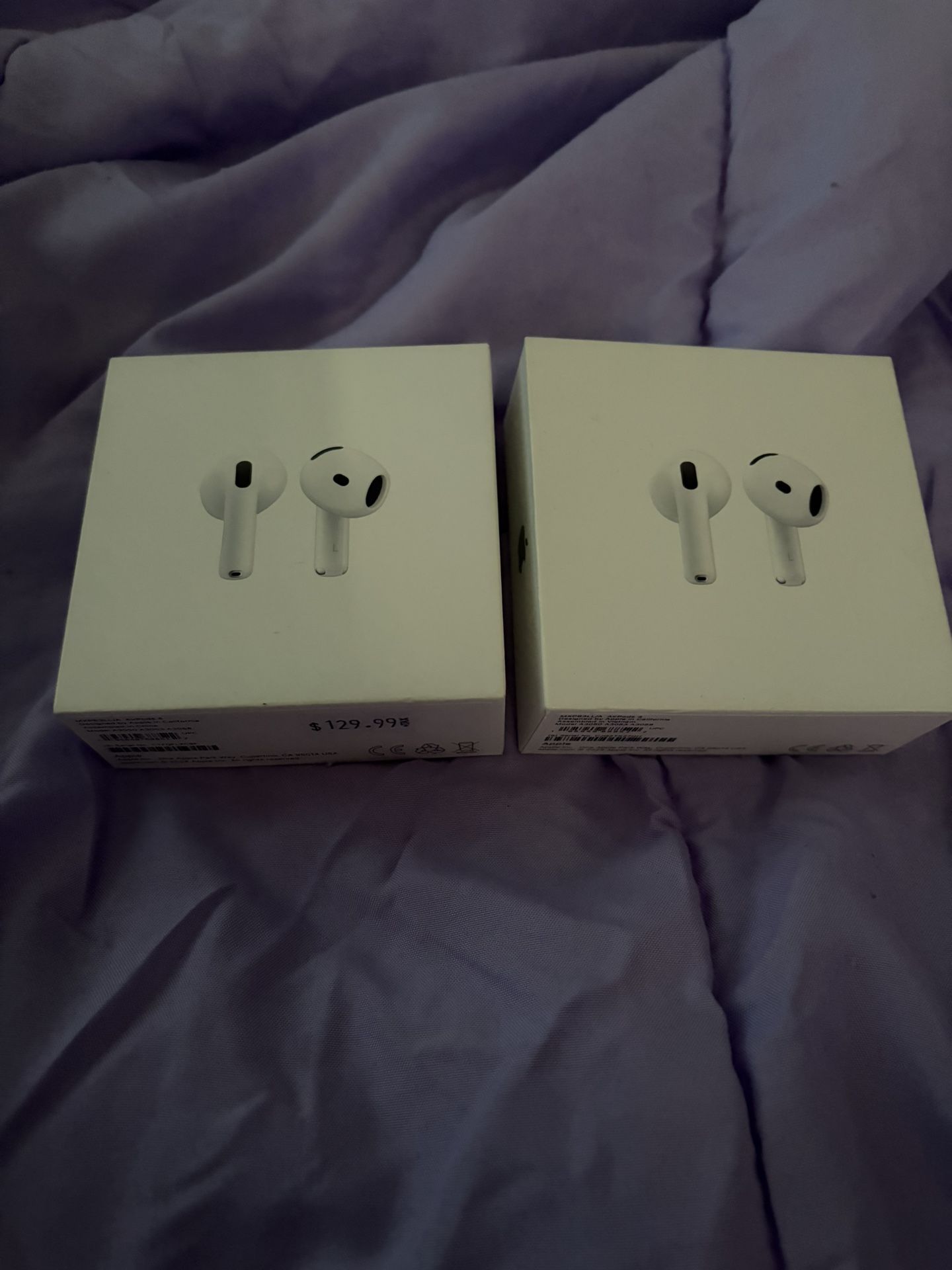 2 Pairs Of Apple AirPods 4’s 
